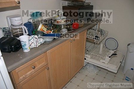 This is how the kitchen has been since 10/22/04.  Yes it is all Louie's.  Note the nearly empty dishwasher.

Filename: crw_3062_std.jpg
Aperture: f/3.5
Shutter Speed: 1/200
Body: Canon EOS DIGITAL REBEL
Lens: Canon EF-S 18-55mm f/3.5-5.6