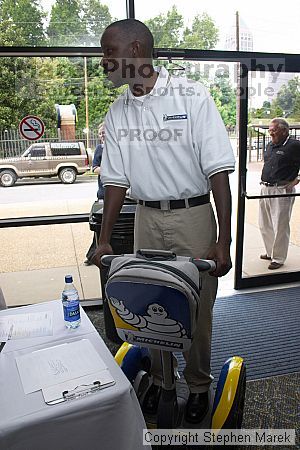 A Michelin recruiter plays with a Segway.

Filename: crw_0776_std.jpg
Aperture: f/7.1
Shutter Speed: 1/200
Body: Canon EOS DIGITAL REBEL
Lens: Canon EF-S 18-55mm f/3.5-5.6