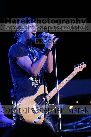 Fuel headlines at Sting Break 2004.

Filename: img_4798_std.jpg
Aperture: f/2.8
Shutter Speed: 1/200
Body: Canon EOS DIGITAL REBEL
Lens: Canon EF 80-200mm f/2.8 L