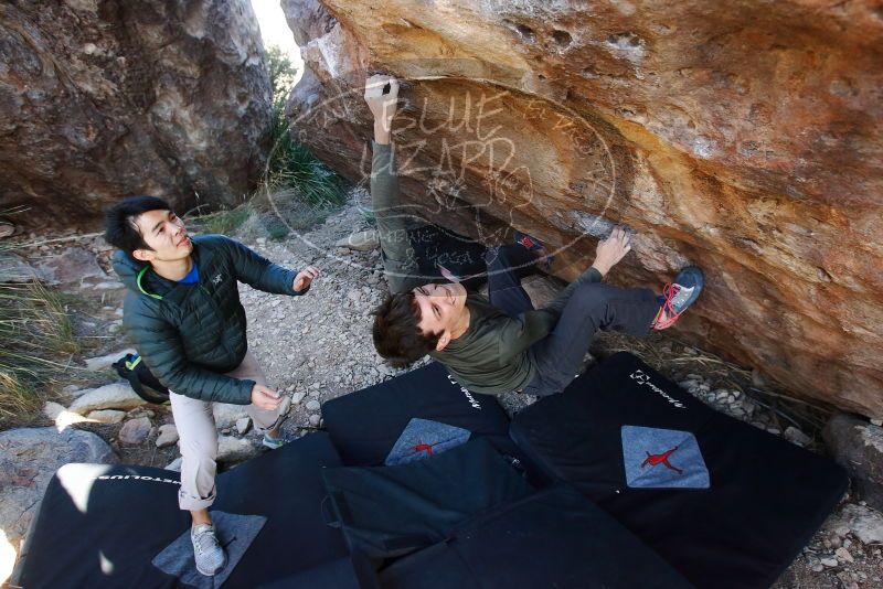 Bouldering in Hueco Tanks on 12/15/2019 with Blue Lizard Climbing and Yoga
Filename: SRM_20191215_1609120.jpg
Aperture: f/4.5
Shutter Speed: 1/250
Body: Canon EOS-1D Mark II
Lens: Canon EF 16-35mm f/2.8 L
