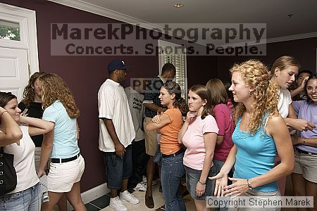 Coach Paul Hewitt grilled hamburgers at AXO Thursday night.  AXO was the winning sorority for the basketball attendance competition.
Filename: crw_0088_std.jpg
Aperture: f/4.5
Shutter Speed: 1/60
Body: Canon EOS DIGITAL REBEL
Lens: Sigma 15-30mm f/3.5-4.5 EX Aspherical DG DF