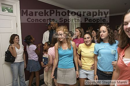 Coach Paul Hewitt grilled hamburgers at AXO Thursday night.  AXO was the winning sorority for the basketball attendance competition.

Filename: crw_0089_std.jpg
Aperture: f/4.5
Shutter Speed: 1/60
Body: Canon EOS DIGITAL REBEL
Lens: Sigma 15-30mm f/3.5-4.5 EX Aspherical DG DF