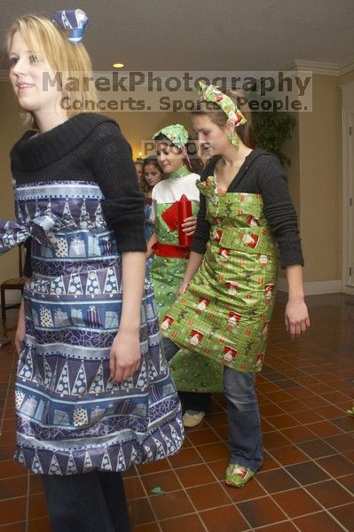 Modeling their wrapping paper outfits at the Alpha Delta Pi Christmas party, Sunday, December 10, 2006.
Filename: SRM_20061210_1843569.jpg
Aperture: f/7.1
Shutter Speed: 1/100
Body: Canon EOS 20D
Lens: Canon EF-S 18-55mm f/3.5-5.6
