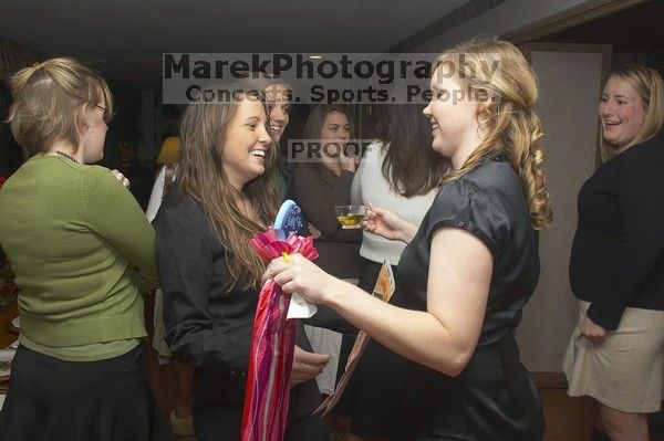 Caitlin Forschner, Natalie Caldwell, and Wendy Howard from left, at the Alpha Xi Delta Christmas dinner, Friday, December 4, 2006.
Filename: SRM_20061204_1754529.jpg
Aperture: f/6.3
Shutter Speed: 1/250
Body: Canon EOS 20D
Lens: Canon EF-S 18-55mm f/3.5-5.6