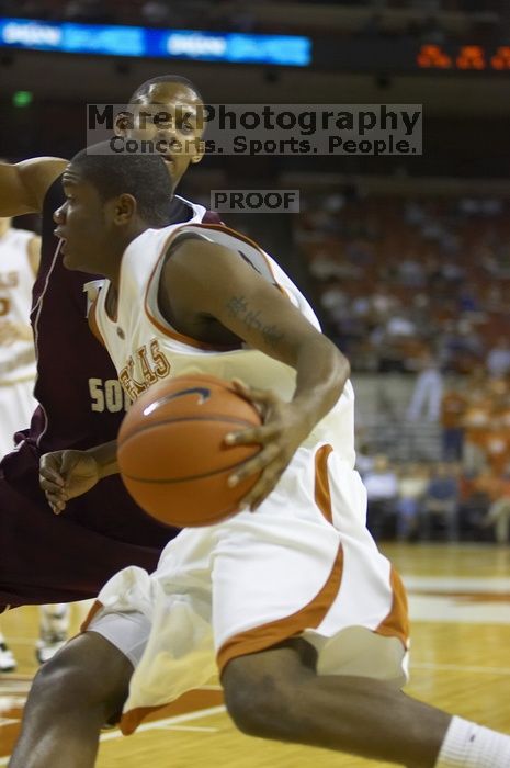 Guard Justin Mason, #24. The longhorns defeated the Texas Southern University (TSU) Tigers 90-50 Saturday night.
Filename: SRM_20061128_1926564.jpg
Aperture: f/2.8
Shutter Speed: 1/640
Body: Canon EOS-1D Mark II
Lens: Canon EF 80-200mm f/2.8 L