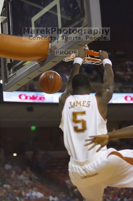 Forward Damion James, #5. The longhorns defeated the Texas Southern University (TSU) Tigers 90-50 Tuesday night.
Filename: SRM_20061128_2008383.jpg
Aperture: f/2.8
Shutter Speed: 1/640
Body: Canon EOS-1D Mark II
Lens: Canon EF 80-200mm f/2.8 L