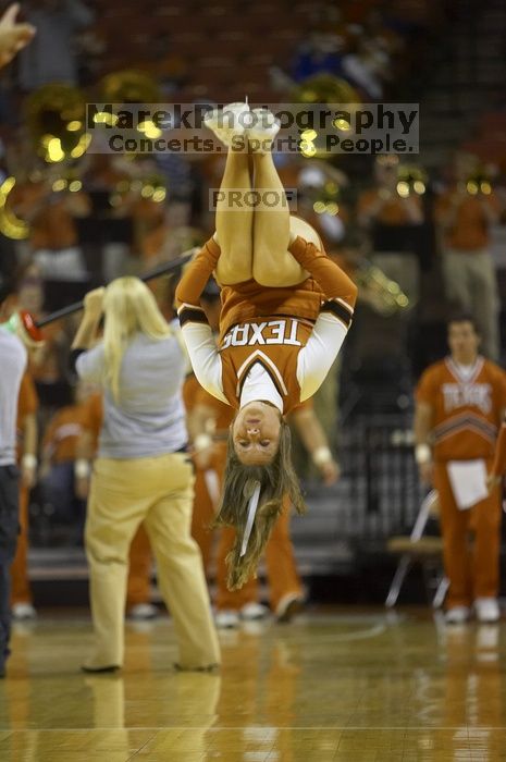 The longhorns defeated the Texas Southern University (TSU) Tigers 90-50 Tuesday night.
Filename: SRM_20061128_2024200.jpg
Aperture: f/2.8
Shutter Speed: 1/640
Body: Canon EOS-1D Mark II
Lens: Canon EF 80-200mm f/2.8 L