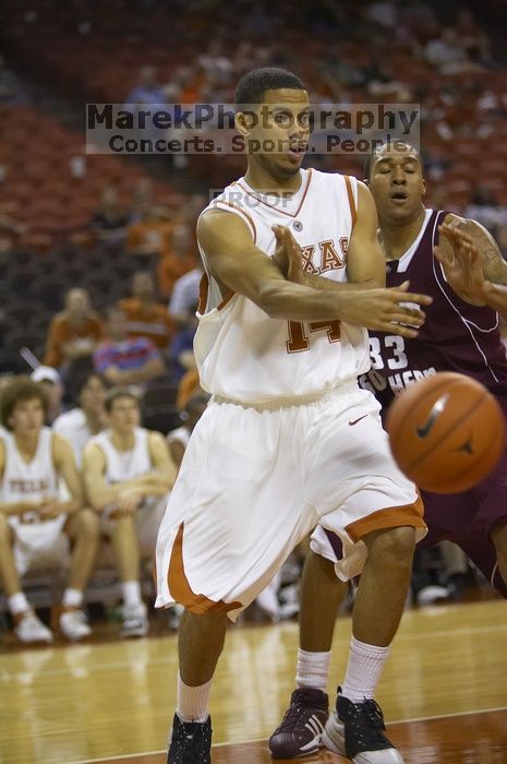 Guard D.J. Augustin, #14.  The longhorns defeated the Texas Southern University (TSU) Tigers 90-50 Tuesday night.

Filename: SRM_20061128_2044146.jpg
Aperture: f/2.8
Shutter Speed: 1/640
Body: Canon EOS-1D Mark II
Lens: Canon EF 80-200mm f/2.8 L