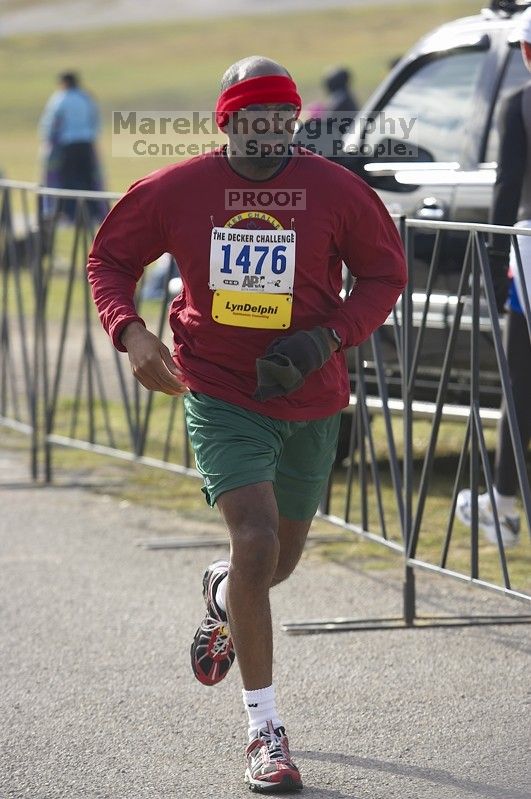 Ed Byrd, 1:32:52, finishing the Decker Challenge 20K 2006 road race.

Filename: SRM_20061203_0936465.jpg
Aperture: f/4.0
Shutter Speed: 1/500
Body: Canon EOS-1D Mark II
Lens: Canon EF 80-200mm f/2.8 L