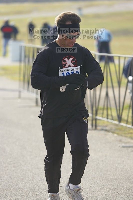 Larry Bright, 1:33:49, finishing the Decker Challenge 20K 2006 road race.

Filename: SRM_20061203_0938280.jpg
Aperture: f/4.0
Shutter Speed: 1/500
Body: Canon EOS-1D Mark II
Lens: Canon EF 80-200mm f/2.8 L