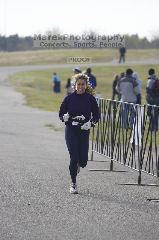 Decker Challenge 20K 2006 road race.

Filename: SRM_20061203_0946188.jpg
Aperture: f/4.0
Shutter Speed: 1/1000
Body: Canon EOS-1D Mark II
Lens: Canon EF 80-200mm f/2.8 L