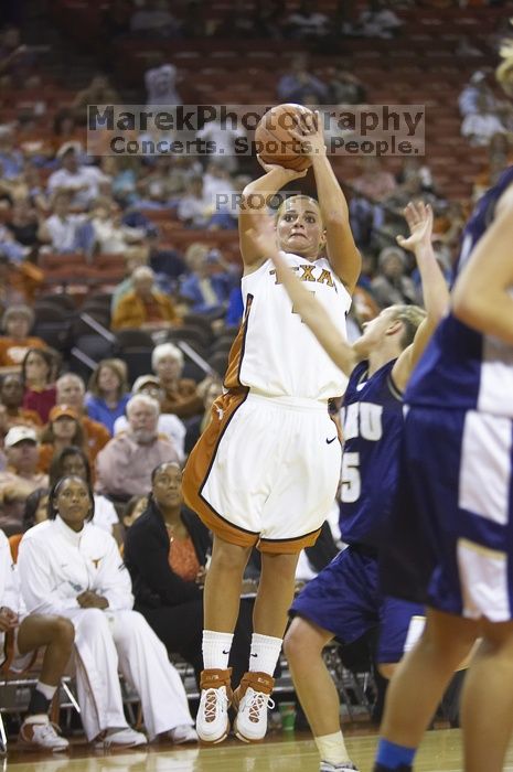 Guard Erika Arriaran, #4. The lady longhorns defeated the Oral Roberts University's (ORU) Golden Eagles 79-40 Saturday night.
Filename: SRM_20061125_1312462.jpg
Aperture: f/2.8
Shutter Speed: 1/400
Body: Canon EOS-1D Mark II
Lens: Canon EF 80-200mm f/2.8 L