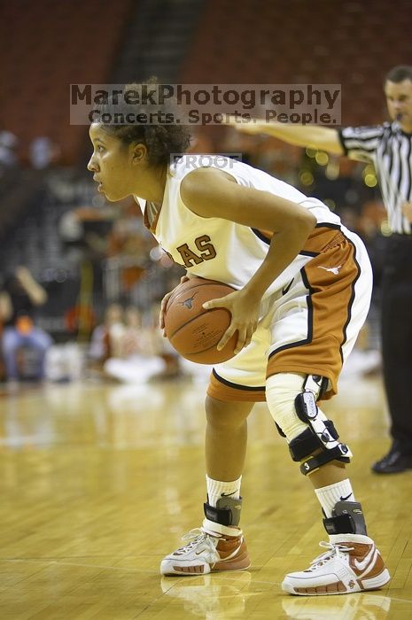 Guard Carla Cortijo, #3.  The lady longhorns defeated the Oral Roberts University's (ORU) Golden Eagles 79-40 Saturday night.

Filename: SRM_20061125_1316086.jpg
Aperture: f/2.8
Shutter Speed: 1/400
Body: Canon EOS-1D Mark II
Lens: Canon EF 80-200mm f/2.8 L