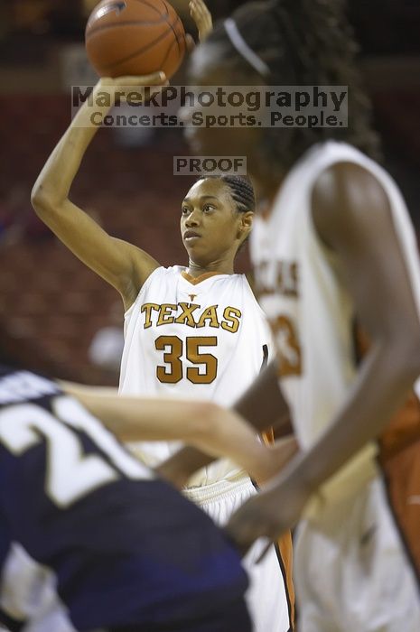 Forward Ashley Lindsey, #35. The lady longhorns defeated the Oral Roberts University's (ORU) Golden Eagles 79-40 Saturday night.
Filename: SRM_20061125_1325404.jpg
Aperture: f/2.8
Shutter Speed: 1/400
Body: Canon EOS-1D Mark II
Lens: Canon EF 80-200mm f/2.8 L
