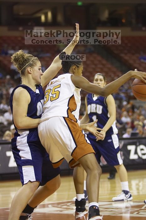 Forward Ashley Lindsey, #35. The lady longhorns defeated the Oral Roberts University's (ORU) Golden Eagles 79-40 Saturday night.
Filename: SRM_20061125_1357081.jpg
Aperture: f/2.8
Shutter Speed: 1/400
Body: Canon EOS-1D Mark II
Lens: Canon EF 80-200mm f/2.8 L