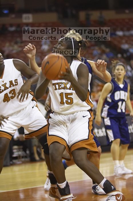 Guard and forward Gabriell Mattox, #15.  The lady longhorns defeated the Oral Roberts University's (ORU) Golden Eagles 79-40 Saturday night.

Filename: SRM_20061125_1403583.jpg
Aperture: f/2.8
Shutter Speed: 1/400
Body: Canon EOS-1D Mark II
Lens: Canon EF 80-200mm f/2.8 L