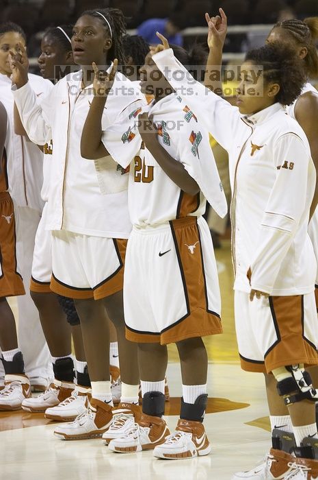 The lady longhorns defeated the Oral Roberts University's (ORU) Golden Eagles 79-40 Saturday night.

Filename: SRM_20061125_1405084.jpg
Aperture: f/4.5
Shutter Speed: 1/200
Body: Canon EOS-1D Mark II
Lens: Canon EF 80-200mm f/2.8 L
