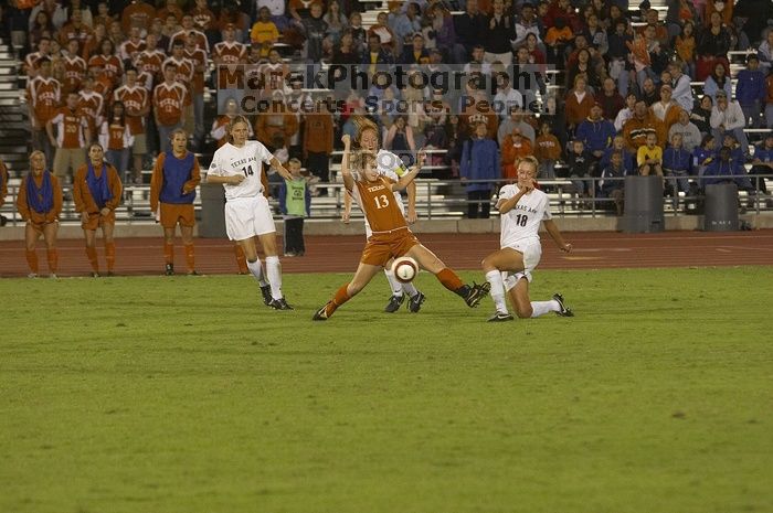 Kelsey Carpenter, #13.  The lady longhorns beat Texas A&M 1-0 in soccer Friday night.

Filename: SRM_20061027_2027147.jpg
Aperture: f/4.0
Shutter Speed: 1/800
Body: Canon EOS 20D
Lens: Canon EF 80-200mm f/2.8 L