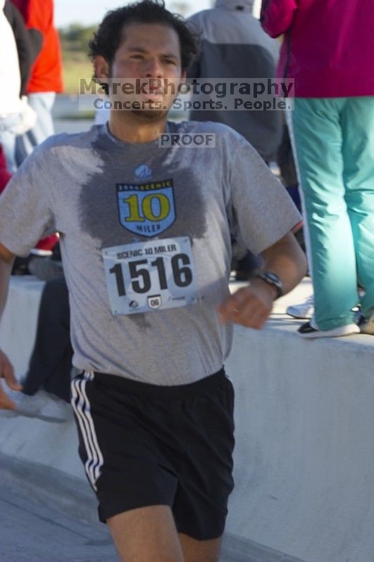 Jonathan Fawcett, bib #1516, placed third with a time of 54:55 at The Girl Scout Scenic 10 Miler road race, Sunday, October 22, 2006.

Filename: SRM_20061022_0850400.jpg
Aperture: f/5.0
Shutter Speed: 1/250
Body: Canon EOS 20D
Lens: Canon EF 80-200mm f/2.8 L