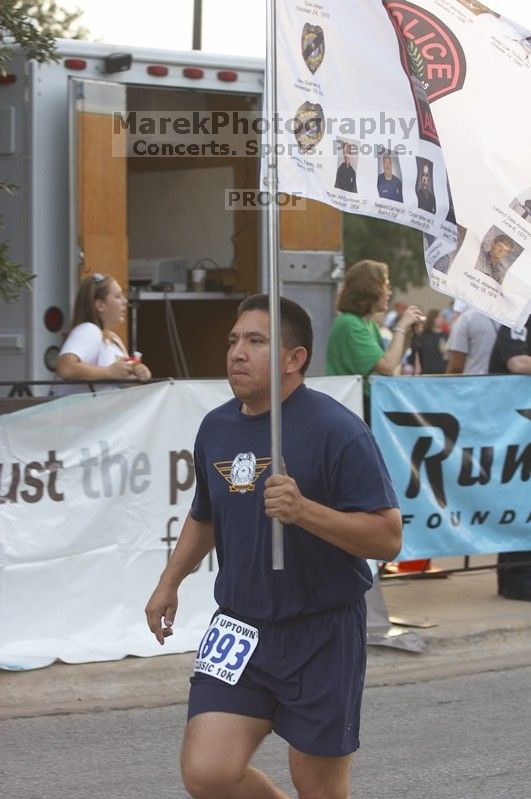 Beth ran the IBM 10K Classic Road Race.

Filename: SRM_20061001_0804047.jpg
Aperture: f/4.0
Shutter Speed: 1/250
Body: Canon EOS 20D
Lens: Canon EF 80-200mm f/2.8 L