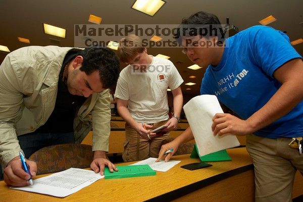 Javier Alarcia, Andrew Hanson, and Alex Tang, from left, signing in at the Engineering Council meeting, Monday, February 19, 2007.
Filename: SRM_20070219_1856481.jpg
Aperture: f/8.0
Shutter Speed: 1/100
Body: Canon EOS-1D Mark II
Lens: Sigma 15-30mm f/3.5-4.5 EX Aspherical DG DF