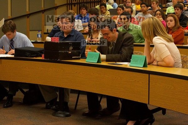 Mark McKeown, Brian Stobie, Ryan McQuiston, and Taylor Castello (from left) at the Engineering Council meeting, Monday, February 19, 2007.

Filename: SRM_20070219_1912405.jpg
Aperture: f/7.1
Shutter Speed: 1/60
Body: Canon EOS 20D
Lens: Canon EF 50mm f/1.8 II