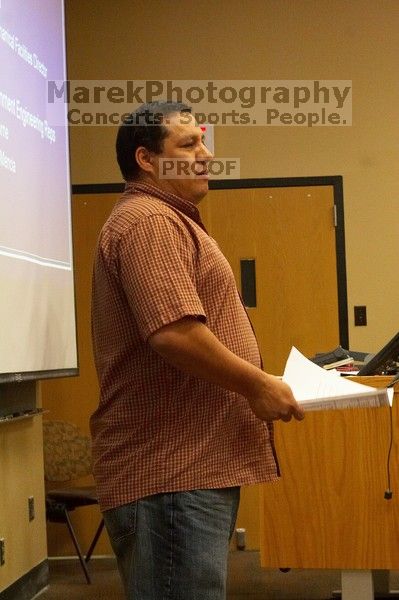 Gonzalo Zapata, the electrical and mechanical facilities director, presenting how they can help, at the Engineering Council meeting, Monday, February 19, 2007.

Filename: SRM_20070219_1913086.jpg
Aperture: f/7.1
Shutter Speed: 1/60
Body: Canon EOS 20D
Lens: Canon EF 50mm f/1.8 II