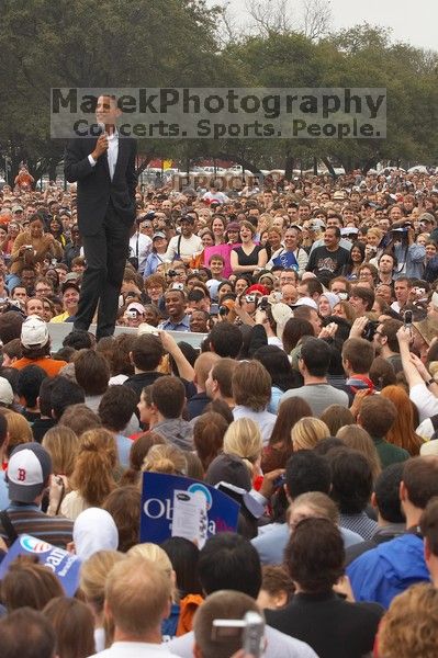 Obama speaking to a crowd of over 20,000 supporters at The Barack Obama "Kick-Ass" Rally--the Obama for president, 2008, rally, held in Austin, Friday, February 23, 2007.
Filename: SRM_20070223_1516421.jpg
Aperture: f/6.3
Shutter Speed: 1/250
Body: Canon EOS 20D
Lens: Canon EF 80-200mm f/2.8 L