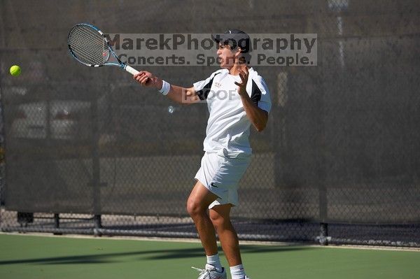 Luis Diaz Barriga.  The University of Texas (UT) men's tennis team defeated Georgia Tech (GT) Saturday, February 24, 2007..

Filename: SRM_20070224_1428204.jpg
Aperture: f/4.0
Shutter Speed: 1/8000
Body: Canon EOS-1D Mark II
Lens: Canon EF 80-200mm f/2.8 L