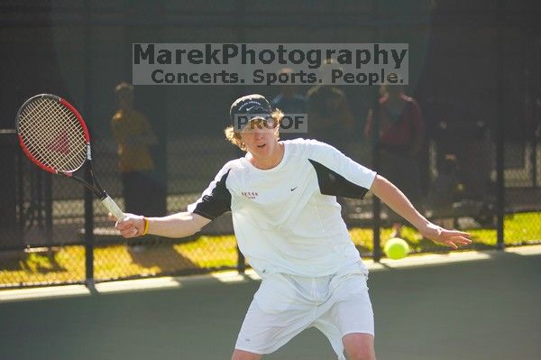 Josh Zavala (UT) was defeated by the Georgia Tech player. The University of Texas (UT) men's tennis team defeated Georgia Tech (GT) Saturday, February 24, 2007..
Filename: SRM_20070224_1507584.jpg
Aperture: f/2.8
Shutter Speed: 1/2000
Body: Canon EOS-1D Mark II
Lens: Canon EF 80-200mm f/2.8 L