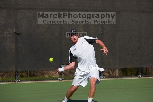Rook Schellenberg (UT) defeated George Gvelesiani (GT) 6-3, 7-6.  The University of Texas (UT) men's tennis team defeated Georgia Tech (GT) Saturday, February 24, 2007..

Filename: SRM_20070224_1514307.jpg
Aperture: f/4.0
Shutter Speed: 1/4000
Body: Canon EOS-1D Mark II
Lens: Canon EF 80-200mm f/2.8 L