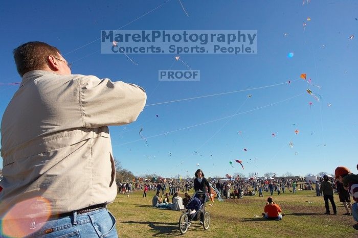 Former UT student Jeff Greenwell attempts to fly a kite at the 79th annual Zilker Park Kite Festival, Sunday, March 4, 2007.
Filename: SRM_20070304_1535142.jpg
Aperture: f/11.0
Shutter Speed: 1/250
Body: Canon EOS-1D Mark II
Lens: Sigma 15-30mm f/3.5-4.5 EX Aspherical DG DF