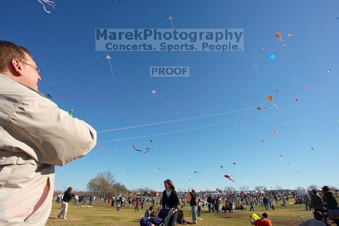Former UT student Jeff Greenwell attempts to fly a kite at the 79th annual Zilker Park Kite Festival, Sunday, March 4, 2007.
Filename: SRM_20070304_1535164.jpg
Aperture: f/11.0
Shutter Speed: 1/250
Body: Canon EOS-1D Mark II
Lens: Sigma 15-30mm f/3.5-4.5 EX Aspherical DG DF