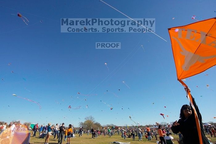 Madhav Tadikonda, class of 1997, and Anjali Patel, class of 1999, fly a UT kite at the 79th annual Zilker Park Kite Festival, Sunday, March 4, 2007.
Filename: SRM_20070304_1537364.jpg
Aperture: f/11.0
Shutter Speed: 1/250
Body: Canon EOS-1D Mark II
Lens: Sigma 15-30mm f/3.5-4.5 EX Aspherical DG DF