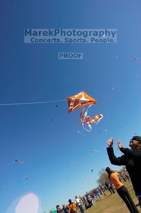 Madhav Tadikonda, class of 1997, and Anjali Patel, class of 1999, fly a UT kite at the 79th annual Zilker Park Kite Festival, Sunday, March 4, 2007.
Filename: SRM_20070304_1538240.jpg
Aperture: f/11.0
Shutter Speed: 1/250
Body: Canon EOS-1D Mark II
Lens: Sigma 15-30mm f/3.5-4.5 EX Aspherical DG DF