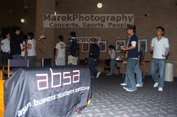 The Asian Business Students Association (ABSA) hosted a chocolate fondue Friday, January 26, 2007 before heading off to a movie premier.

Filename: SRM_20070126_1627484.jpg
Aperture: f/5.0
Shutter Speed: 1/125
Body: Canon EOS 20D
Lens: Canon EF-S 18-55mm f/3.5-5.6