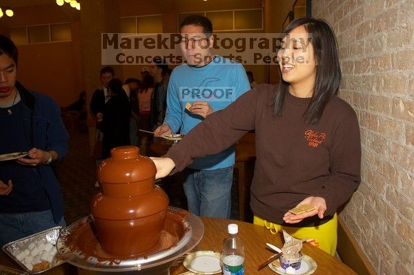 Gloria Sun and Samuel Liu. The Asian Business Students Association (ABSA) hosted a chocolate fondue Friday, January 26, 2007 before heading off to a movie premier.
Filename: SRM_20070126_1650226.jpg
Aperture: f/5.6
Shutter Speed: 1/160
Body: Canon EOS 20D
Lens: Canon EF-S 18-55mm f/3.5-5.6