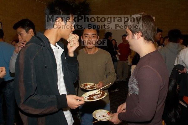 The Asian Business Students Association (ABSA) hosted a chocolate fondue Friday, January 26, 2007 before heading off to a movie premier.

Filename: SRM_20070126_1700525.jpg
Aperture: f/5.6
Shutter Speed: 1/160
Body: Canon EOS 20D
Lens: Canon EF-S 18-55mm f/3.5-5.6