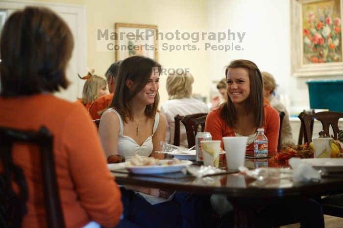 Hannah Koeijmans (in white), Madeline Koeijmans (in red), Grace Koeijmans (in brown and orange) and their parents. Kappa Kappa Gamma (KKG) hosted a parents' weekend barbecue before the UT vs Nebraska football game on Saturday, October 27, 2007 at their so
Filename: SRM_20071027_1150469.jpg
Aperture: f/1.8
Shutter Speed: 1/50
Body: Canon EOS-1D Mark II
Lens: Canon EF 50mm f/1.8 II