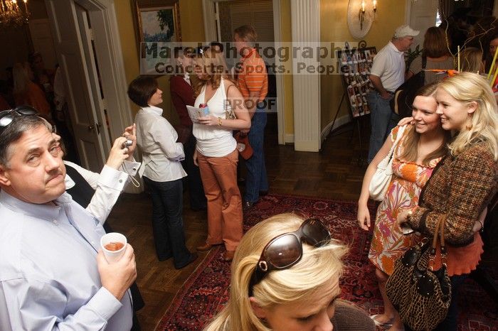 Laura Fowler, far right, poses with Georgia Dealey as Georgia's mother takes a photo. Kappa Kappa Gamma (KKG) hosted a parents' weekend barbecue before the UT vs Nebraska football game on Saturday, October 27, 2007 at their sorority house.
Filename: SRM_20071027_1230040.jpg
Aperture: f/8.0
Shutter Speed: 1/30
Body: Canon EOS 20D
Lens: Canon EF-S 18-55mm f/3.5-5.6