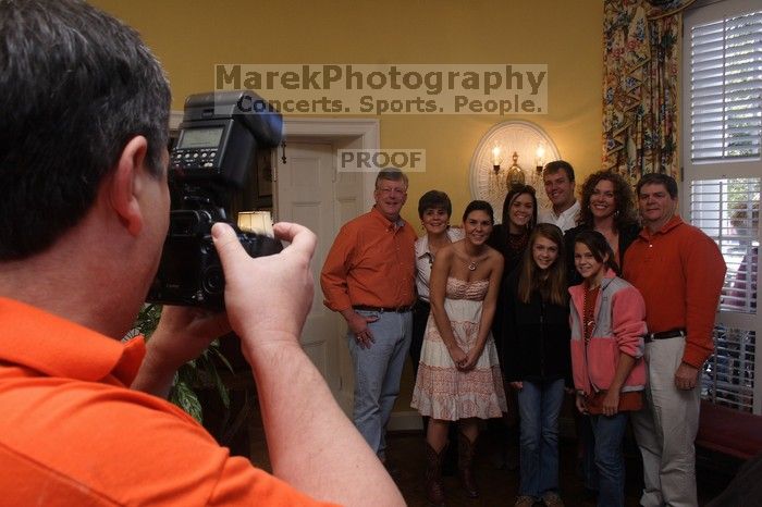 Malorie Liljenwall, with cousins, and sister Lauren (Kappa) and mother (Kappa) pose for a photo.  Kappa Kappa Gamma (KKG) hosted a parents' weekend barbecue before the UT vs Nebraska football game on Saturday, October 27, 2007 at their sorority house.

Filename: SRM_20071027_1233521.jpg
Aperture: f/8.0
Shutter Speed: 1/30
Body: Canon EOS 20D
Lens: Canon EF-S 18-55mm f/3.5-5.6