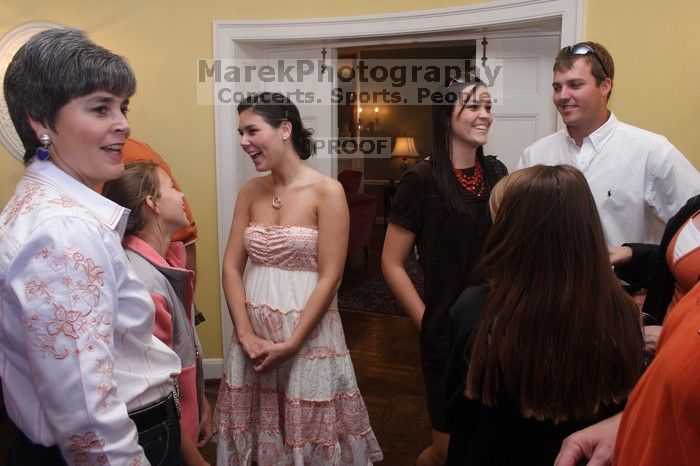 Malorie Liljenwall with her sister Lauren (Kappa), mother (Kappa), cousins, and others. Kappa Kappa Gamma (KKG) hosted a parents' weekend barbecue before the UT vs Nebraska football game on Saturday, October 27, 2007 at their sorority house.
Filename: SRM_20071027_1237287.jpg
Aperture: f/8.0
Shutter Speed: 1/30
Body: Canon EOS 20D
Lens: Canon EF-S 18-55mm f/3.5-5.6