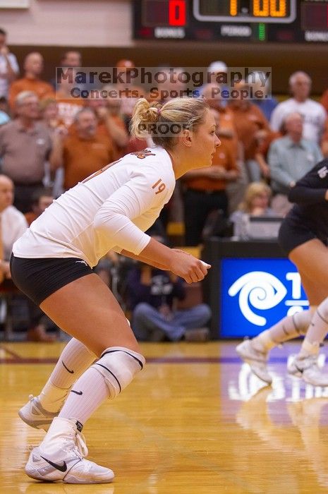 UT sophomore Heather Kisner (#19, DS) waits for the ball.  The Longhorns defeated the Huskers 3-0 on Wednesday night, October 24, 2007 at Gregory Gym.

Filename: SRM_20071024_1837448.jpg
Aperture: f/3.2
Shutter Speed: 1/400
Body: Canon EOS-1D Mark II
Lens: Canon EF 80-200mm f/2.8 L
