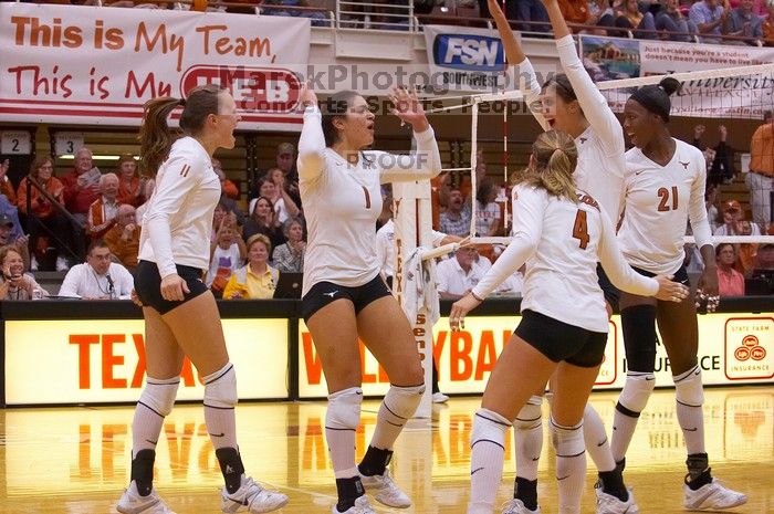 UT junior Kiley Hall (#11, DS/L), UT freshman Juliann Faucette (#1, OH), UT senior Michelle Moriarty (#4, S), UT junior Lauren Paolini (#3, UTIL) and UT sophomore Destinee Hooker (#21, OH) are ecstatic after a point.  The Longhorns defeated the Huskers 3-0

Filename: SRM_20071024_1954543.jpg
Aperture: f/4.0
Shutter Speed: 1/400
Body: Canon EOS-1D Mark II
Lens: Canon EF 80-200mm f/2.8 L