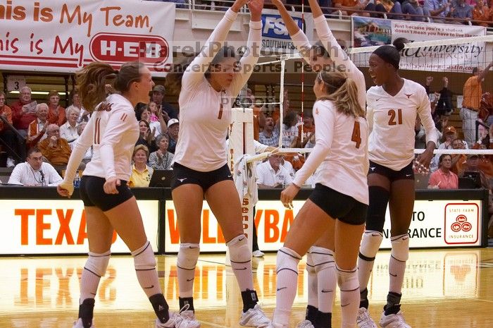 UT junior Kiley Hall (#11, DS/L), UT freshman Juliann Faucette (#1, OH), UT senior Michelle Moriarty (#4, S), UT junior Lauren Paolini (#3, UTIL) and UT sophomore Destinee Hooker (#21, OH) are ecstatic after a point. The Longhorns defeated the Huskers 3-0
Filename: SRM_20071024_1954564.jpg
Aperture: f/4.0
Shutter Speed: 1/400
Body: Canon EOS-1D Mark II
Lens: Canon EF 80-200mm f/2.8 L