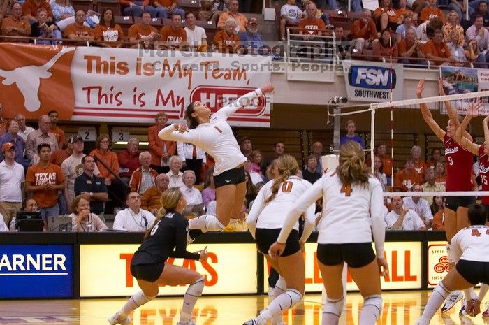 UT freshman Juliann Faucette (#1, OH) floats, waiting to spike the ball towards Nebraska senior Sarah Pavan (#9, RS) and Nebraska sophomore Kori Cooper (#15, MB) as UT senior Alyson Jennings (#16, L), UT sophomore Ashley Engle (#10, S/RS), UT senior Michel
Filename: SRM_20071024_2012406.jpg
Aperture: f/4.0
Shutter Speed: 1/400
Body: Canon EOS-1D Mark II
Lens: Canon EF 80-200mm f/2.8 L