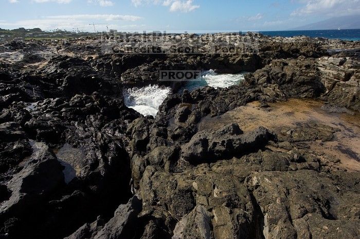 Hike to the Nakalele blowholes along the surf-beaten lava formations.
Filename: SRM_20071219_1229337.jpg
Aperture: f/8.0
Shutter Speed: 1/2500
Body: Canon EOS-1D Mark II
Lens: Sigma 15-30mm f/3.5-4.5 EX Aspherical DG DF