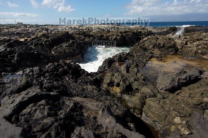 Hike to the Nakalele blowholes along the surf-beaten lava formations.
Filename: SRM_20071219_1229429.jpg
Aperture: f/8.0
Shutter Speed: 1/2500
Body: Canon EOS-1D Mark II
Lens: Sigma 15-30mm f/3.5-4.5 EX Aspherical DG DF