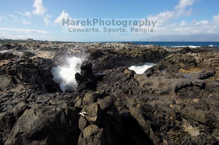 Hike to the Nakalele blowholes along the surf-beaten lava formations.
Filename: SRM_20071219_1229572.jpg
Aperture: f/8.0
Shutter Speed: 1/2500
Body: Canon EOS-1D Mark II
Lens: Sigma 15-30mm f/3.5-4.5 EX Aspherical DG DF