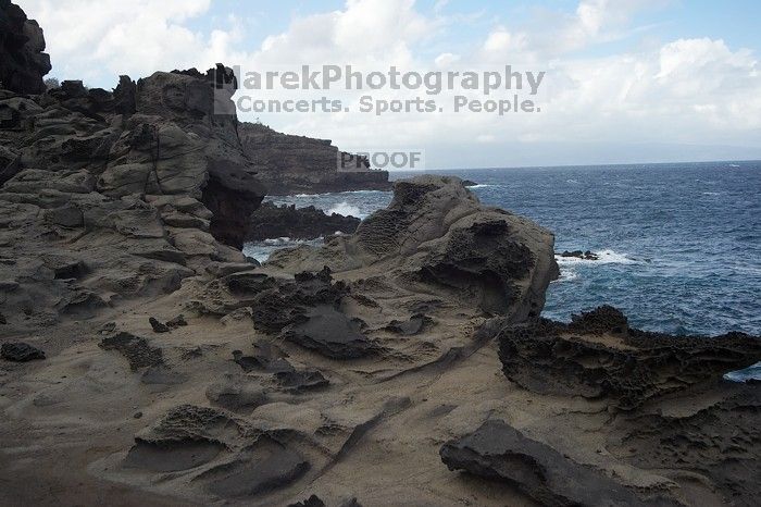 Hike to the Nakalele blowholes along the surf-beaten lava formations.
Filename: SRM_20071219_1339140.jpg
Aperture: f/10.0
Shutter Speed: 1/800
Body: Canon EOS-1D Mark II
Lens: Sigma 15-30mm f/3.5-4.5 EX Aspherical DG DF